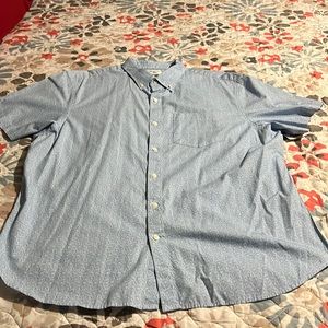 Brand new man’s short sleeve shirt color blue and white size 2xxl price 23.00